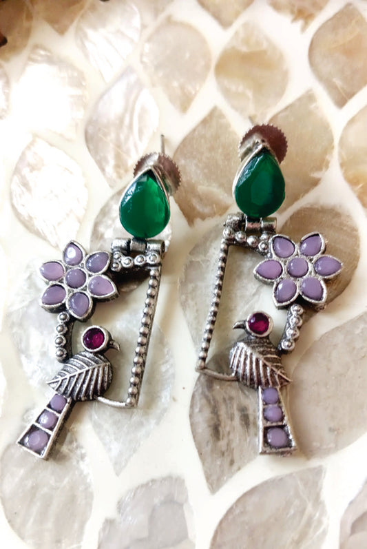 Mirage -Oxidized Peacock and Floral Drop Earrings with Purple and Aqua Stones