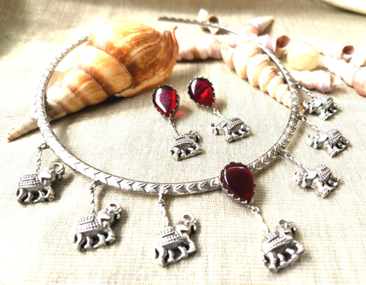 Mirage - Stylish Hasli necklace on Red stone and hanging elephant design and a beautiful marching earrings