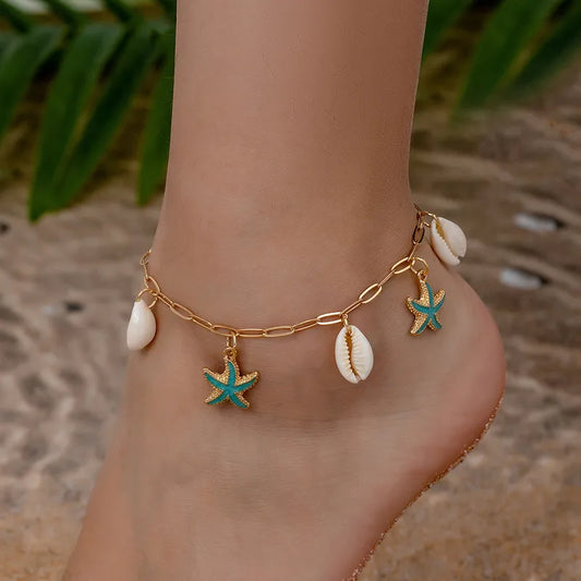 Mirage - Blue enamel Starfish and shell golden anklets .