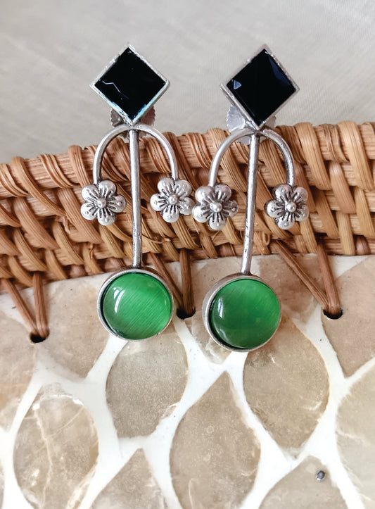 Mirage  - Duel color big floral light weight stylish earrings .