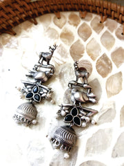 Mirage  -Antique Silver Animal Motif Jhumka Earrings with Magenta Stone Accents