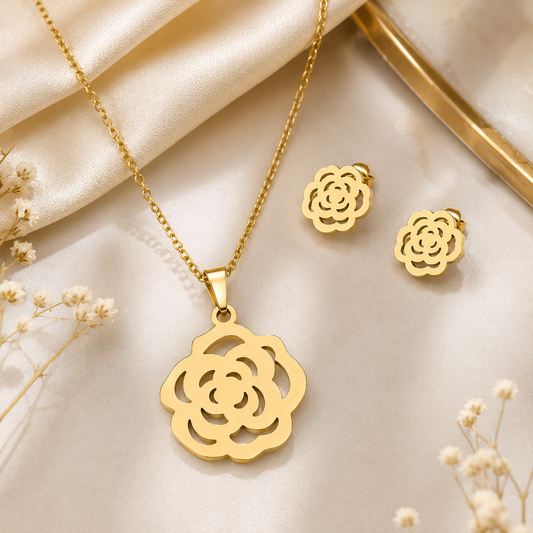 Anti tarnish gold floral pendant necklace with matching flower stud earrings for women, minimalist designer jewellery set with premium gold finish.