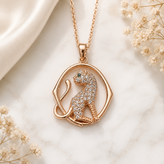 Anti tarnish rose gold leopard pendant necklace with sparkling cubic zirconia stones and green crystal eyes for women, elegant designer fashion jewellery.
