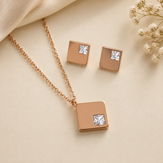 Anti tarnish rose gold square pendant necklace with princess-cut crystal and matching square stud earrings for women featuring a minimalist luxury design.