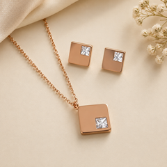 Anti tarnish rose gold square pendant necklace with princess-cut crystal and matching square stud earrings for women featuring a minimalist luxury design.