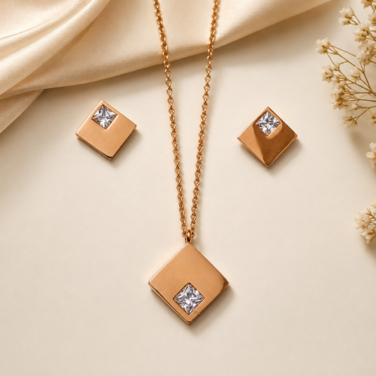 Anti tarnish rose gold square pendant necklace with princess-cut crystal and matching square stud earrings for women featuring a minimalist luxury design.