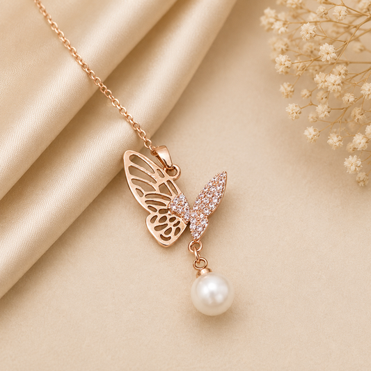 Anti tarnish rose gold butterfly pendant necklace featuring sparkling cubic zirconia wings and a pearl drop for women.
