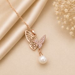 Anti tarnish rose gold butterfly pendant necklace featuring sparkling cubic zirconia wings and a pearl drop for women.
