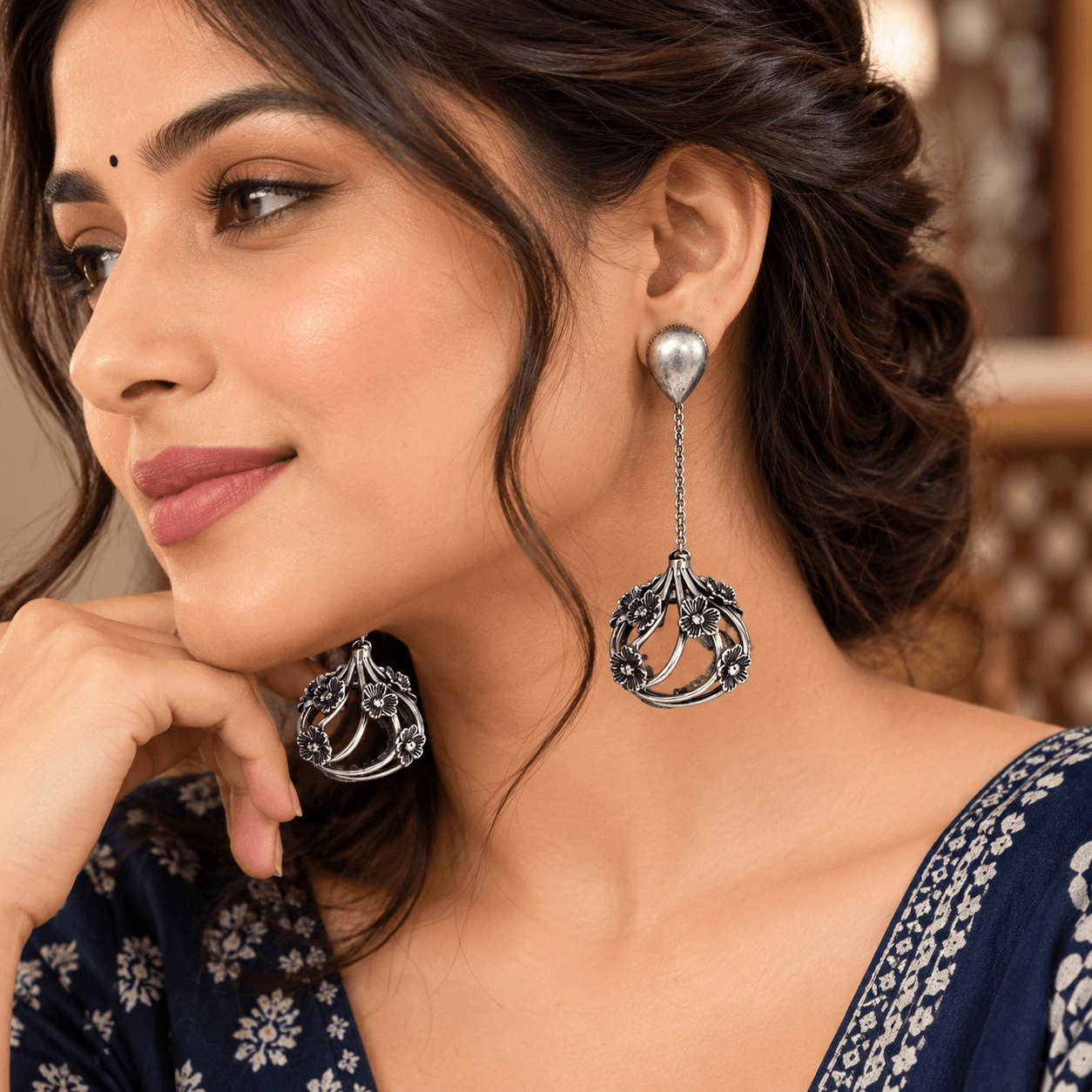 Antique silver-tone floral drop earrings with chain links and an openwork flower frame