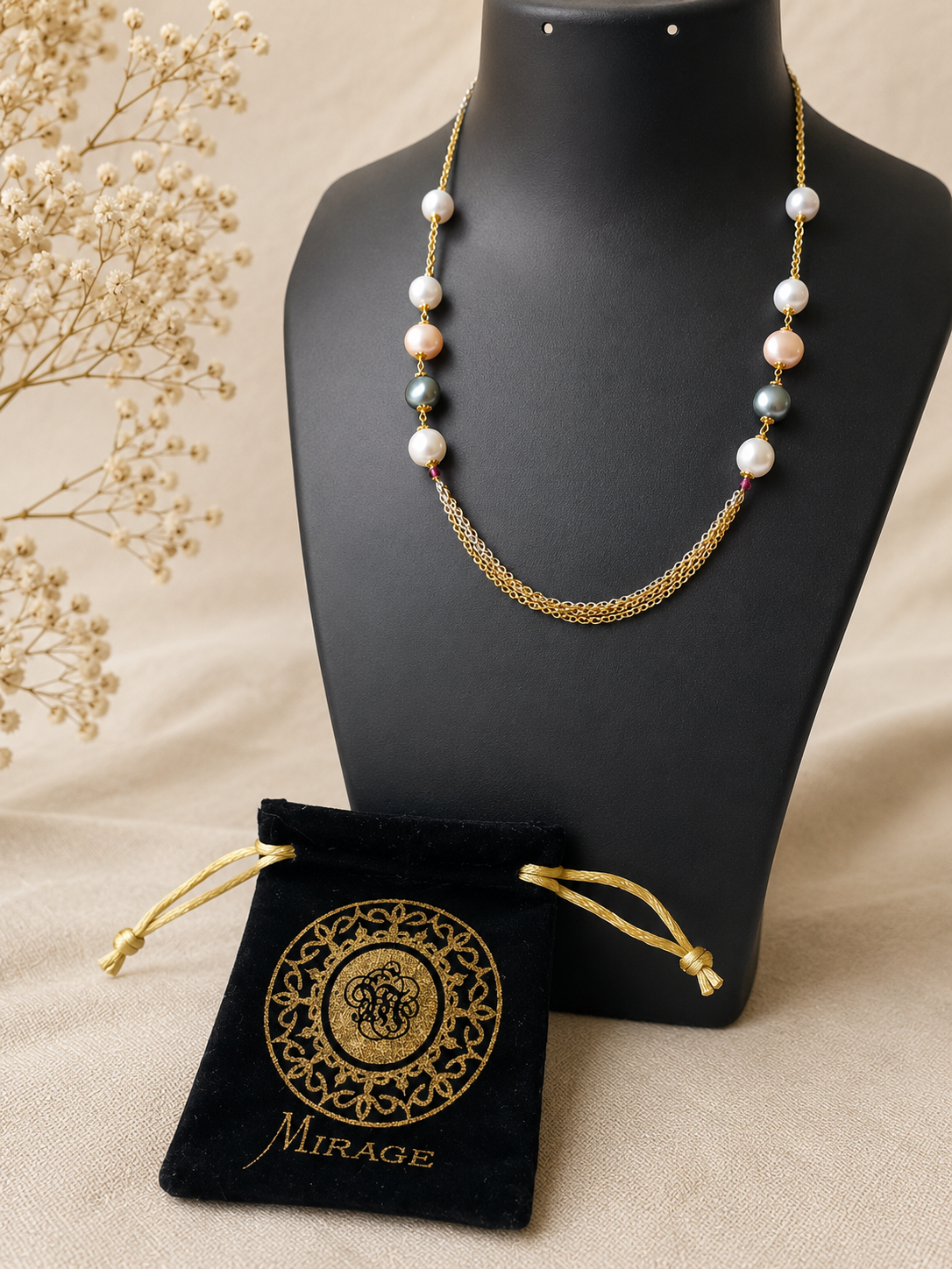 Elegant multi pearl layered necklace with dual-tone chains and white, champagne, and grey pearls for women by The Mirage Fashion.