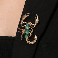 Mirage -Bold Scorpion Brooch in Gold with Teal Enamel – Unique Zodiac-Inspired Statement Pin for Women