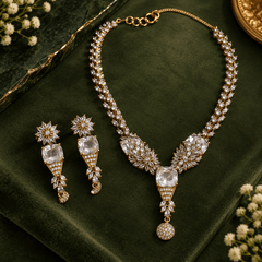 Floral crystal necklace with square-cut clear stones, gold-tone detailing and matching drop earrings in Mehendi finish