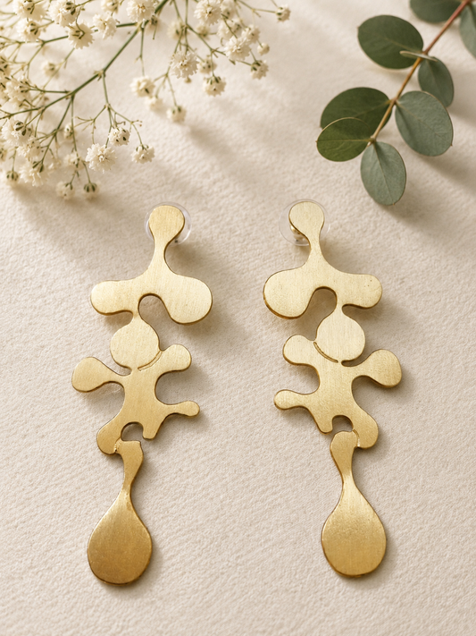 Handcrafted contemporary lightweight brass long statement earrings with matte gold finish for women.