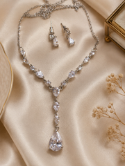 Luxury American Diamond necklace set with matching teardrop earrings for women, featuring sparkling CZ stones by The Mirage Fashion.