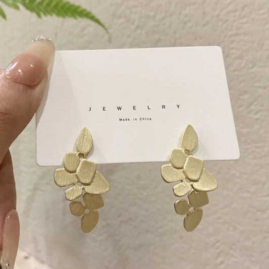 Matte Gold Floral Drop Earrings for Women | Elegant Statement Jewelry – The Mirage Fashion