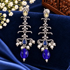 Blue beaded chandelier earrings with pale yellow stones, pearl-like accents and silver-tone detailing