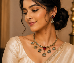 Oxidised Elephant Charm Choker Necklace Set with Ruby Red Stones |  Traditional Hasli Statement Jewelry for Women | The Mirage Fashion 
