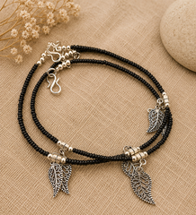 The Mirage Fashion Black Beaded Leaf Charm Anklet – Dual Layer Boho Gold-Tone Payal for Women