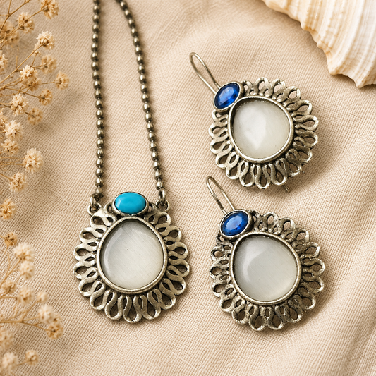 The Mirage Fashion White Stone & Blue Accent Pendant Necklace Set – Vintage Silver-Tone Statement Jewelry Set with Matching Earrings