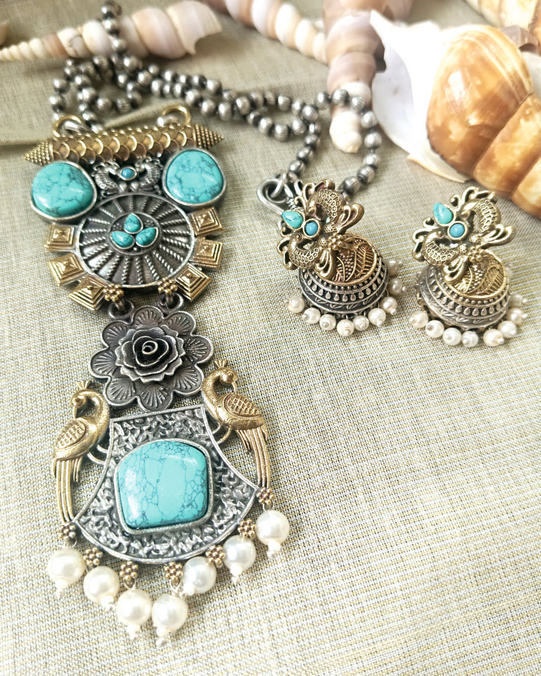 Mirage -  Ethnic Silver-Gold  Dual tone Necklace Set with Turquoise Stones and Pearls  with beautiful Jumki style earrings