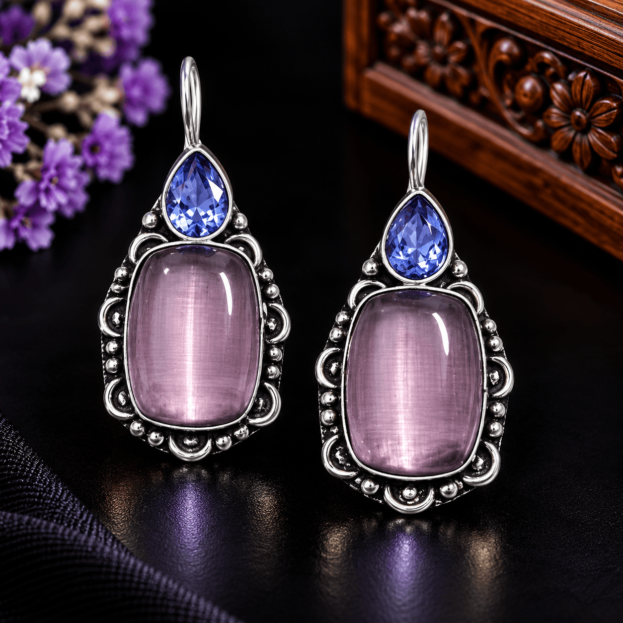 Lavender rectangular stone-style drop earrings with blue teardrop accents and ornate silver-tone detailing