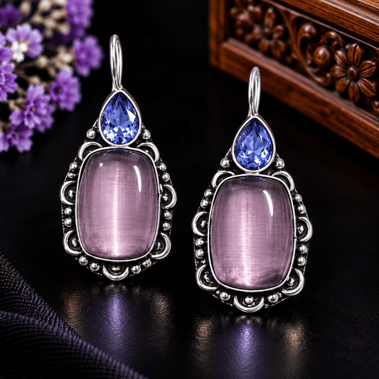 Lavender rectangular stone-style drop earrings with blue teardrop accents and ornate silver-tone detailing