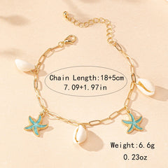 Mirage - Blue enamel  Starfish and shell  golden anklets .