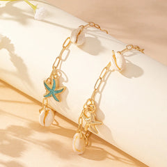 Mirage - Blue enamel  Starfish and shell  golden anklets .