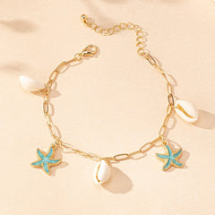 Mirage - Blue enamel  Starfish and shell  golden anklets .