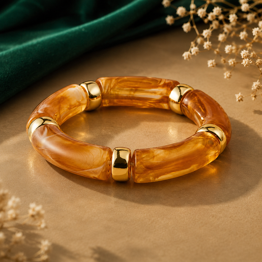Amber brown chunky bangle for women with gold-tone accents