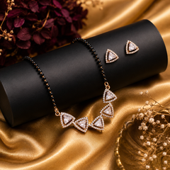Black beaded mangalsutra with sparkling triangle pendant and matching earrings