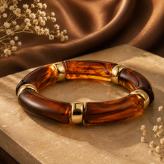 Brown tortoiseshell open kada for women with gold-tone accents