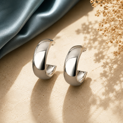 Stylish chunky open hoop earrings with polished metallic finish