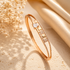 Gold American Diamond designer bangle for women with square centre stone