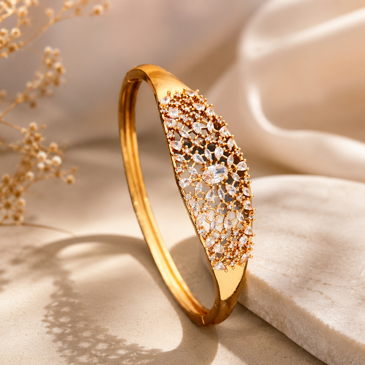 Gold American Diamond designer kada for women with intricate floral stonework