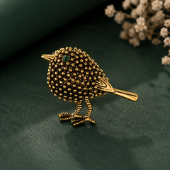 Gold bird-shaped statement brooch pin for women