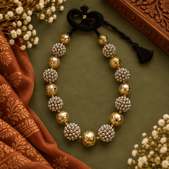 Gold and silver beaded statement necklace for women with black thread tie