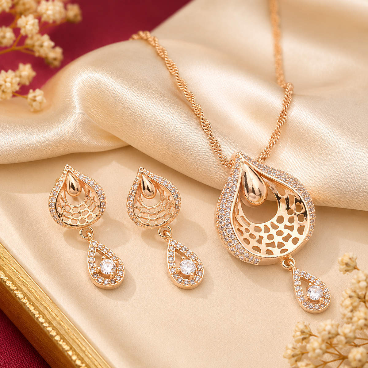 Gold teardrop pendant necklace and matching crystal drop earrings set for women