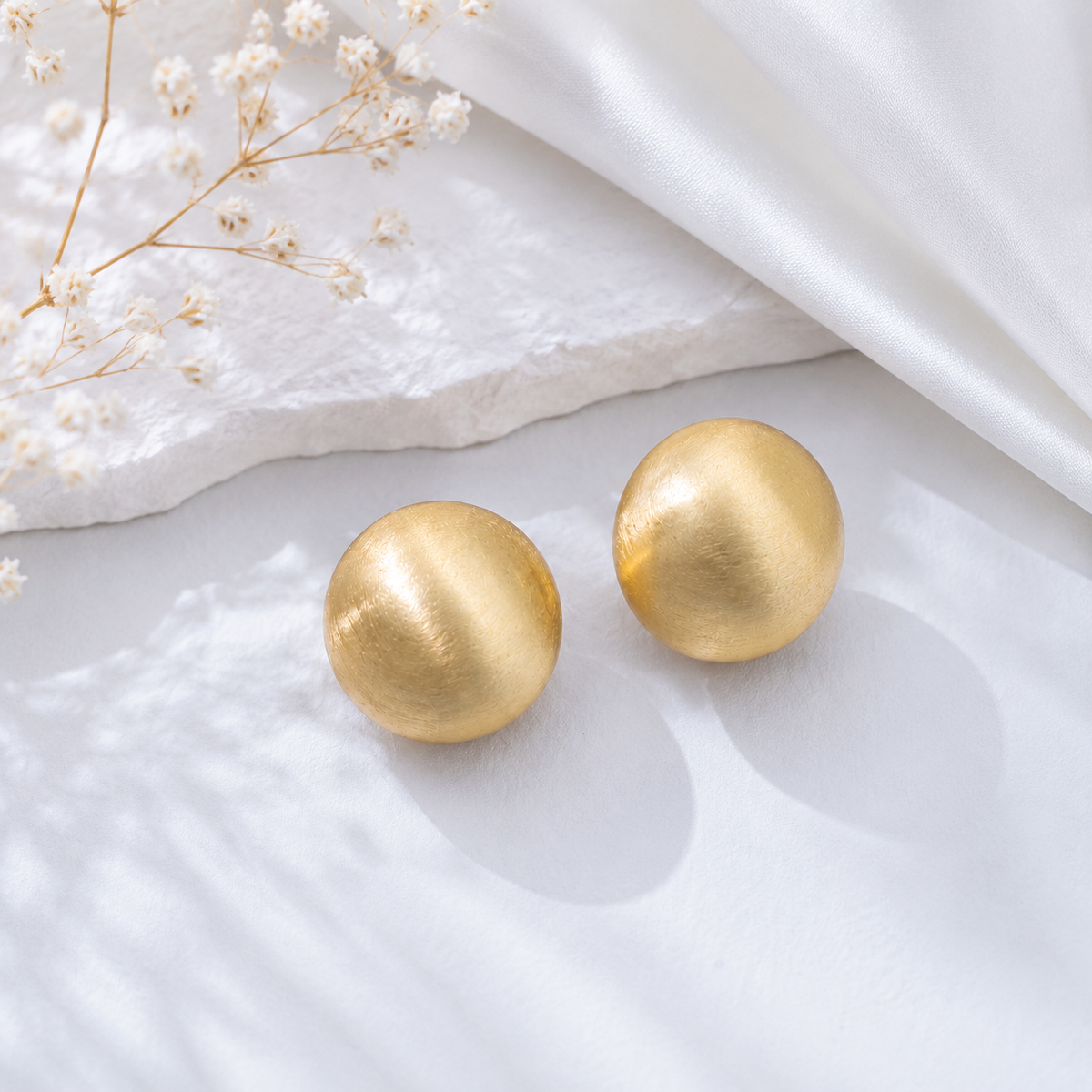 Gold textured round ball stud earrings for women