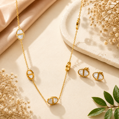 Gold-tone oval Mother of Pearl necklace and matching stud earrings with white inlay detailing