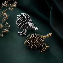 Gold bird-shaped statement brooch pin for women