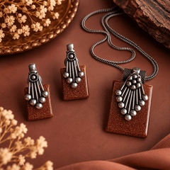 Goldstone oxidized silver pendant necklace with brown braided thread and matching earrings