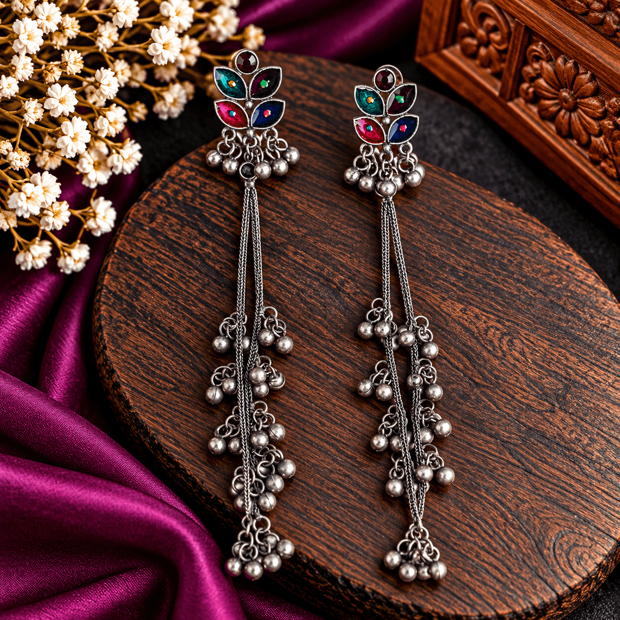 Kashmiri Heritage multicolour meenakari statement earrings with oxidized silver-tone finish, colourful leaf motifs and dangling bead chains