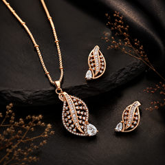 Gold-tone leaf crystal necklace and matching earrings set for women