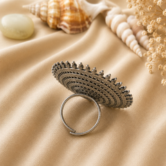 Oxidised silver circular statement ring for women with intricate concentric detailing