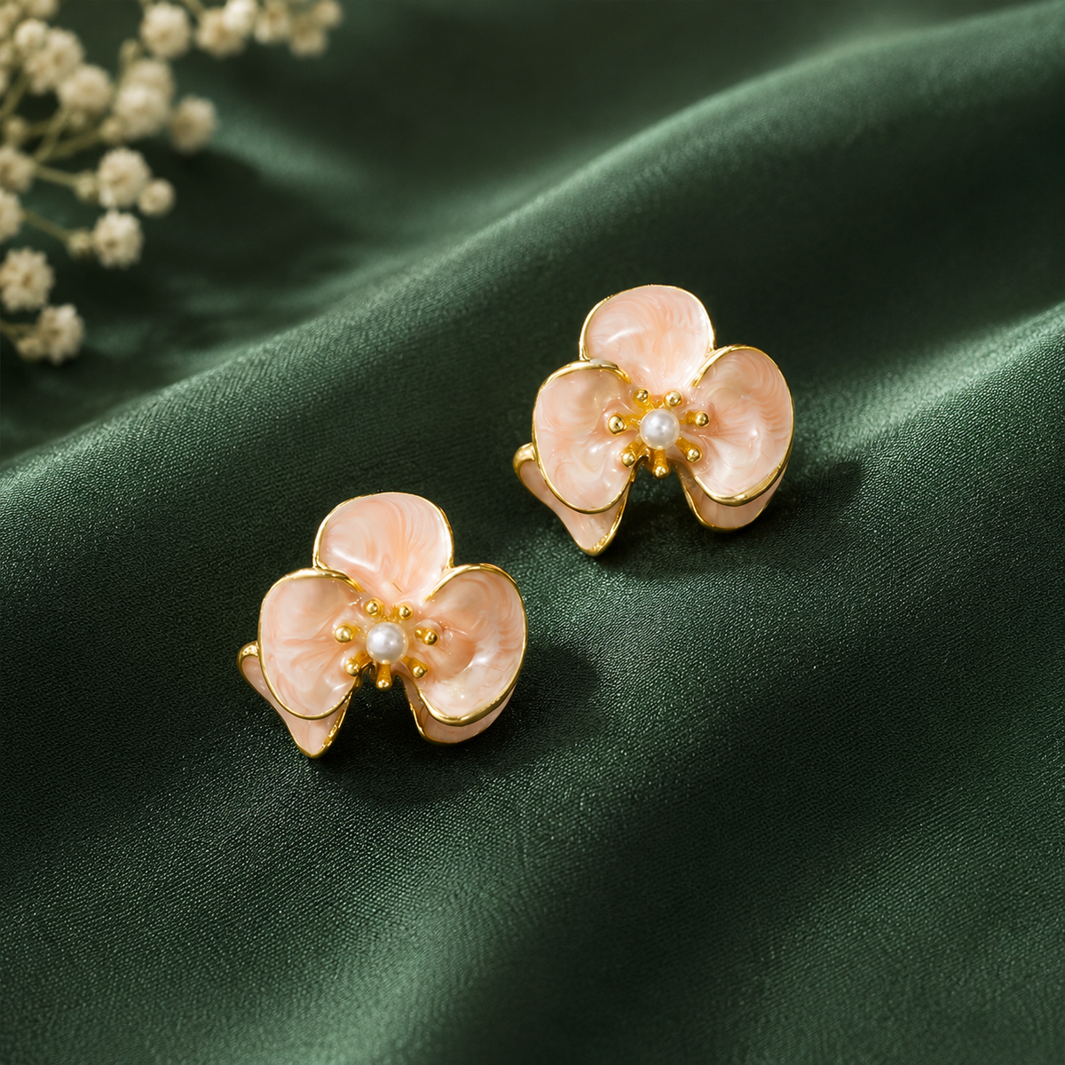 Peach floral stud earrings with pearl detail for women