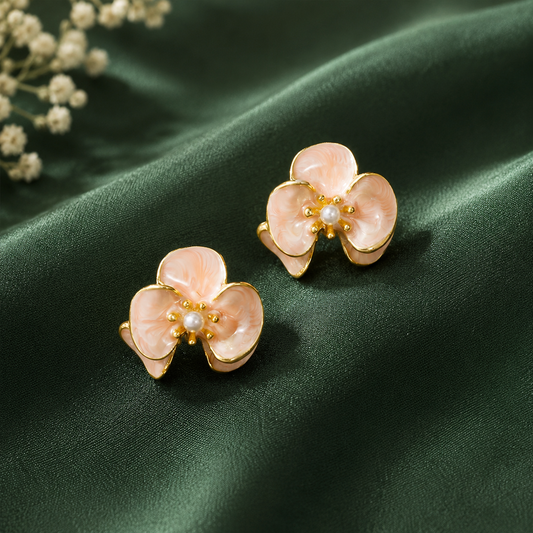Peach floral stud earrings with pearl detail for women