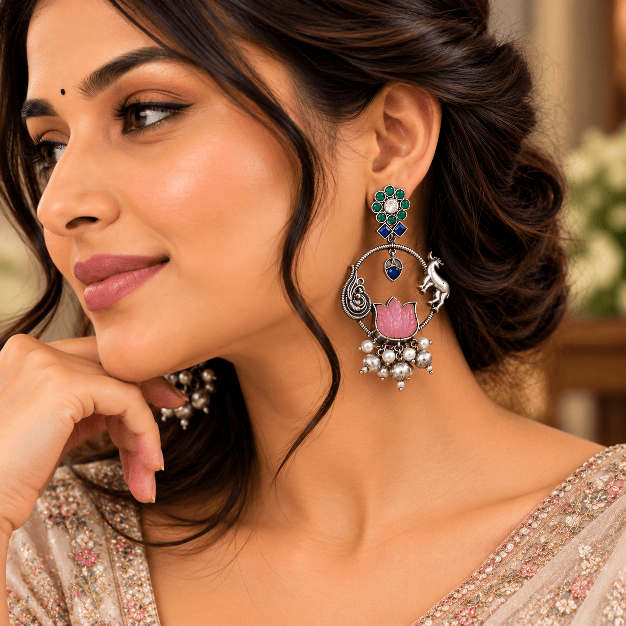 Pink lotus stone-work oxidized earrings with green and blue stones, peacock-inspired silver detailing and dangling beads