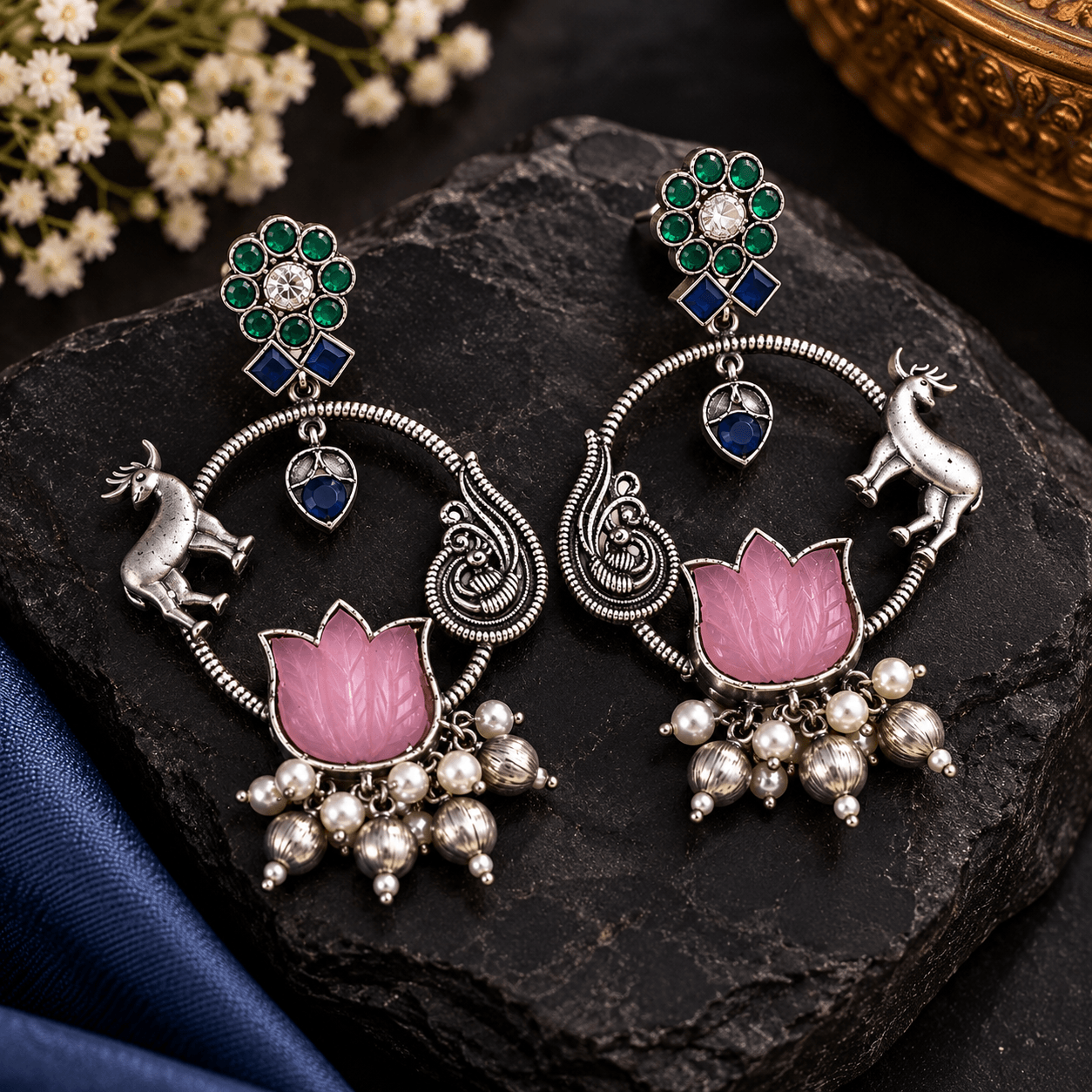 Pink lotus stone-work oxidized earrings with green and blue stones, peacock-inspired silver detailing and dangling beads
