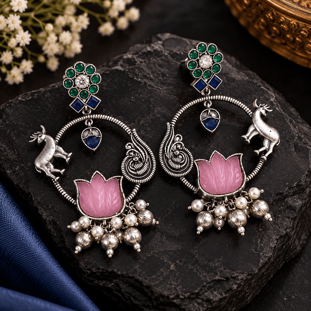 Pink lotus stone-work oxidized earrings with green and blue stones, peacock-inspired silver detailing and dangling beads